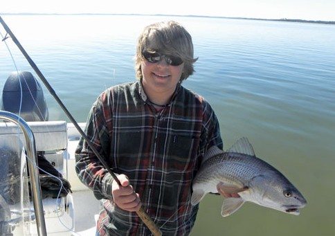 Caleb Davis with a Lowcountry redfish caught on the fly. Photo by Ron Davis