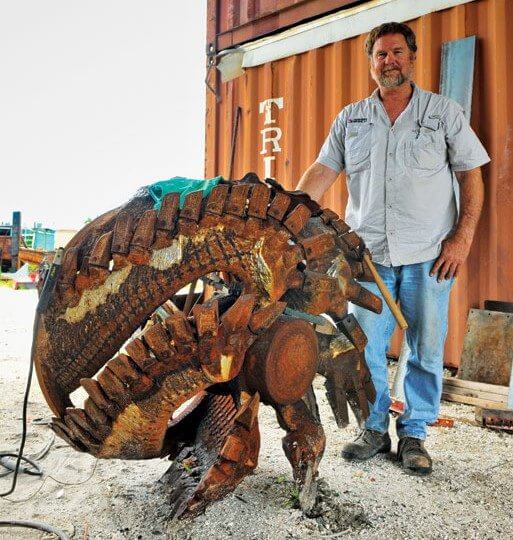 Dredging Equipment - Don Fletcher of Florida Dredge and Dock standing beside one of his dredging heads.