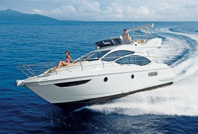 The new 2012 Azimut 40 races to the Hall of Fame docks at Las Olas Marina for the Fort Lauderdale International Boat Show. Courtesy Fort Lauderdale International Boat Show