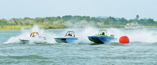 National Tri Hull Powerboats Championship - During an early heat on Saturday, Wesley Cheatham (No. 4) of Trinity, Texas, cuts ahead of Reuben Stafford of Richmond, Texas (center), and Chad Breckenridge of Thibadeaux, La. Photo by Joanne Lucey