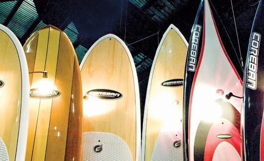A selection of high quality Coreban SUP boards on display at Surf Expo in Orlando. Photo By Glenn Hayes