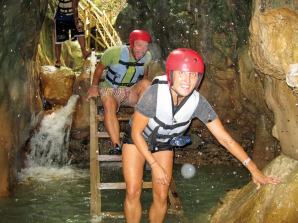 Climbing through the canyons at the 27 Charcos in Damajagua. Photo by Tasha Hacker