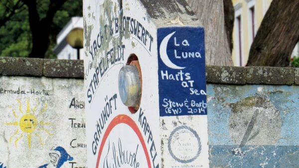 Following tradition, Barbara and EW added La Luna’s name to Horta’s famous wall. Photo by Barbara Hart
