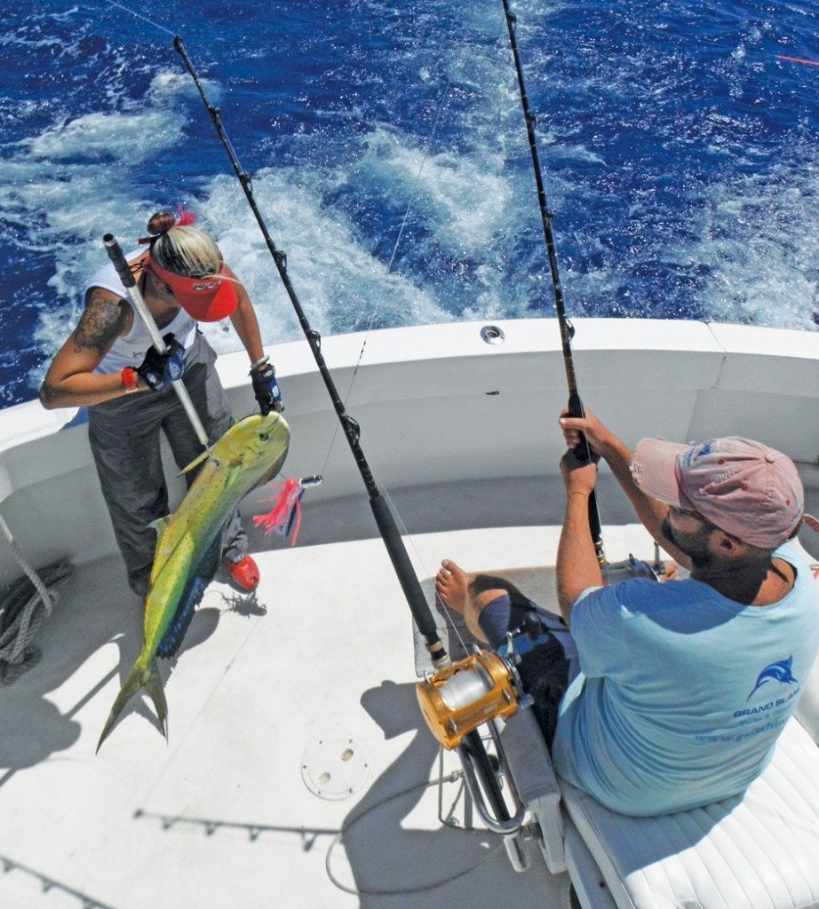 Andy hauls in a mahi mahi on day one