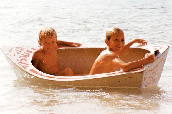 Boat Cruising with kids. Kess Smith and his friend Ian Everton from SV Gaucho trying out our Tipsqueek. Photo by Janet Hein