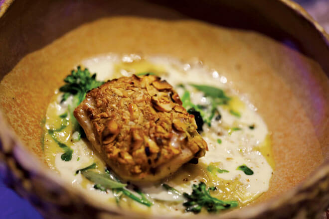 Main Dish – Mahi Mahi Cooked over Charcoal, Mushroom Fermented Risotto, Buerre Blanc, Hazelnut Crunch, Lemon Verbena Leaves, Broccolini, Black Caviar.