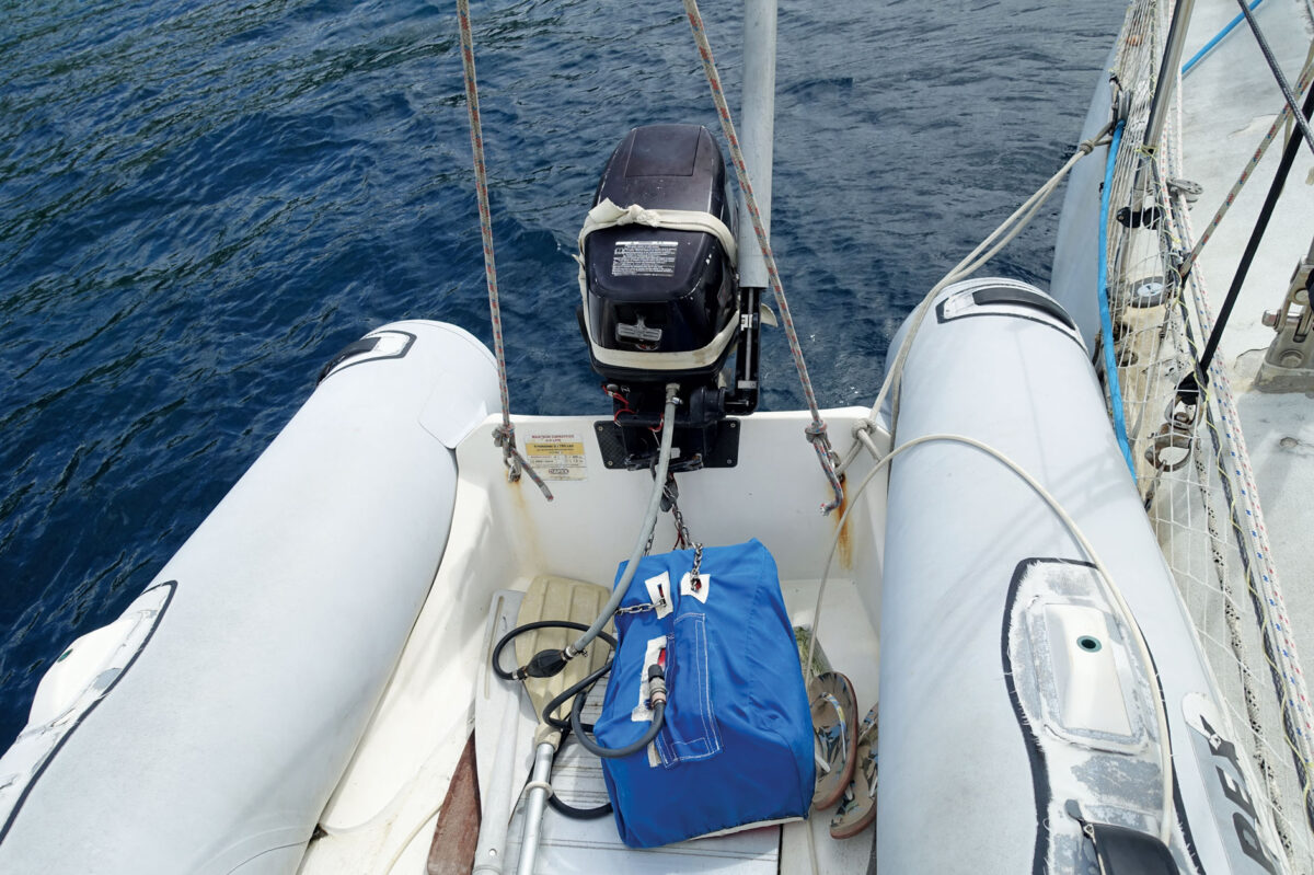 Dinghy lifted for the night, outboard and tank locked